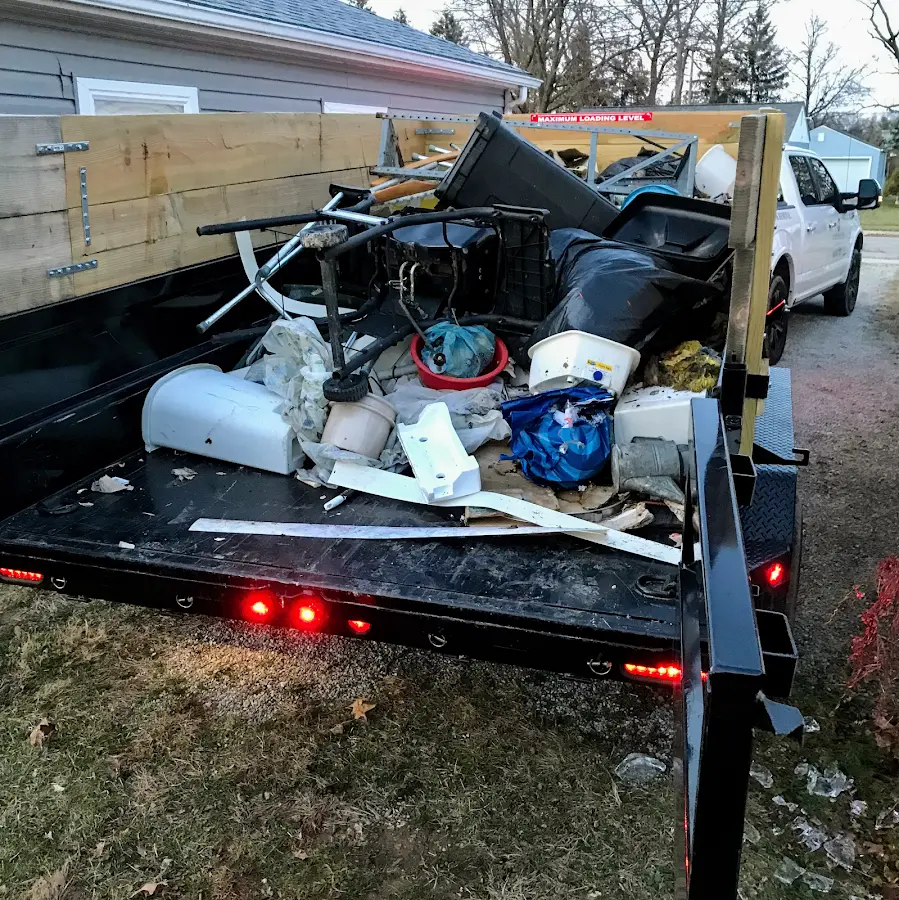 Roll-off dumpster delivered to a residential driveway in Forward